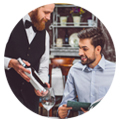 Segmentation customers restaurants man offering wine to a customer