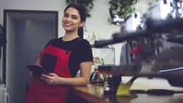 restaurant onwer at desk