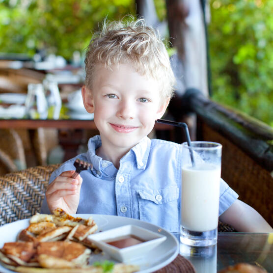 Child eating breakfast