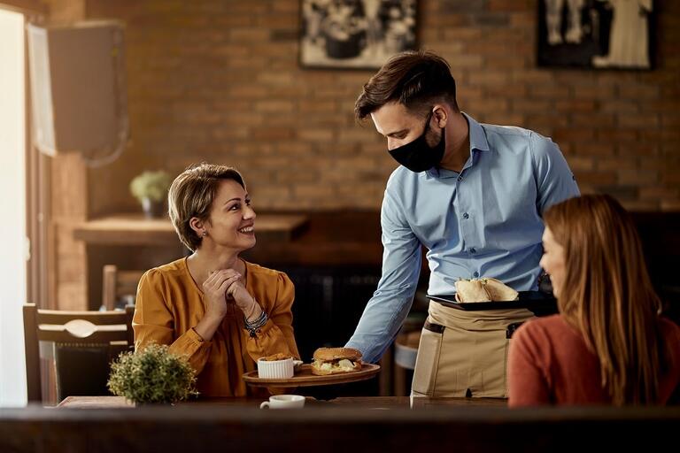 waiter with covid mask