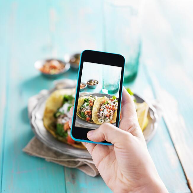 using phone to take food photo
